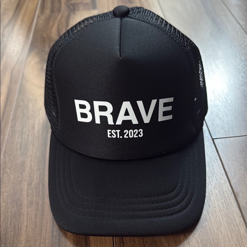 Rave Black Trucker Hat with White Text